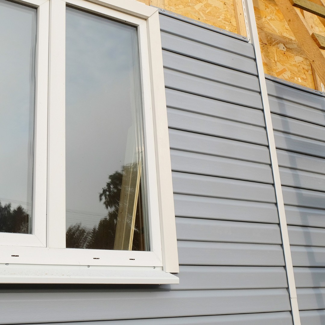 siding covering the wall of a house under construction
